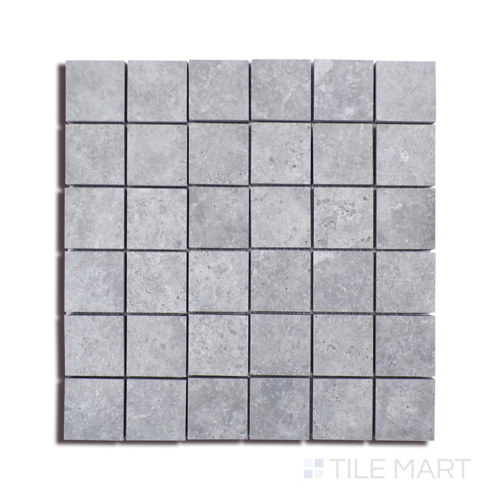Angled shot of LEGIONS LUNAR SILVER 2X2 MATTE MOSAIC PORCELAIN MOSAIC with a MATTE finish, revealing the depth of the product with a skewed visual perspective.
