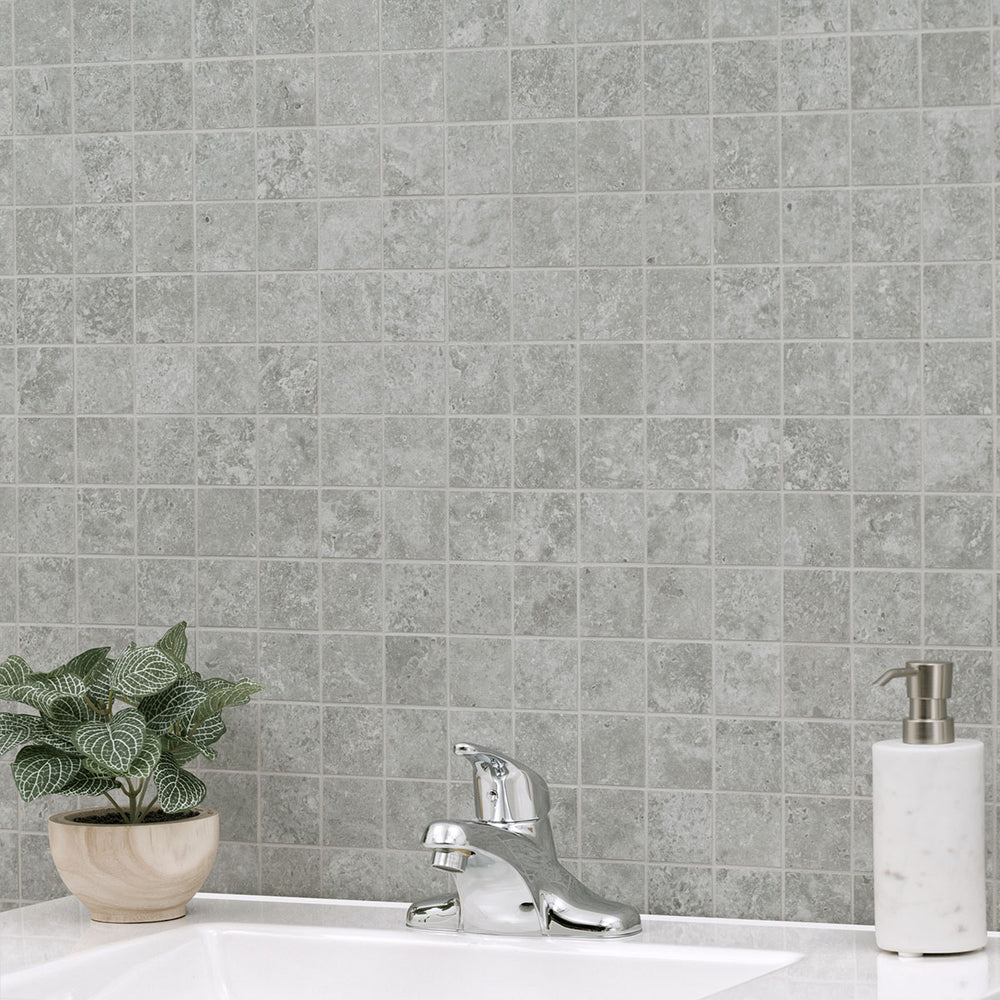 Highlighting the elegance of LEGIONS LUNAR SILVER 2X2 MATTE MOSAIC PORCELAIN MOSAIC with a MATTE finish, blending effortlessly with the surrounding modern elements.