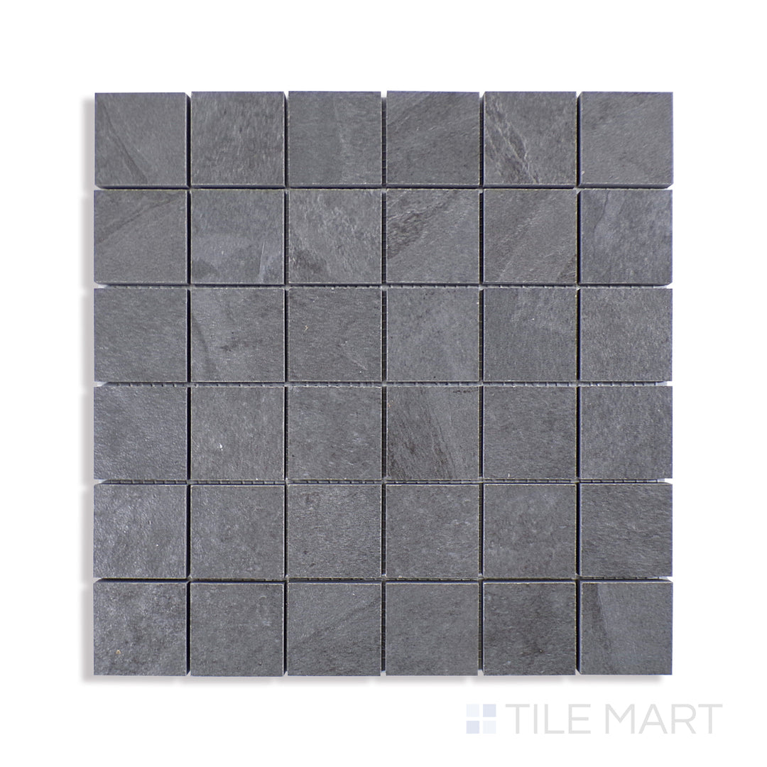 Angled shot of LEGIONS MIDNIGHT MONTAGE 2X2MATTE MOSAIC PORCELAIN MOSAIC with a MATTE finish, offering a detailed look at the material's finish with a tilted viewpoint.