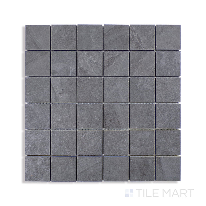 Angled shot of LEGIONS MIDNIGHT MONTAGE 2X2MATTE MOSAIC PORCELAIN MOSAIC with a MATTE finish, offering a detailed look at the material's finish with a tilted viewpoint.