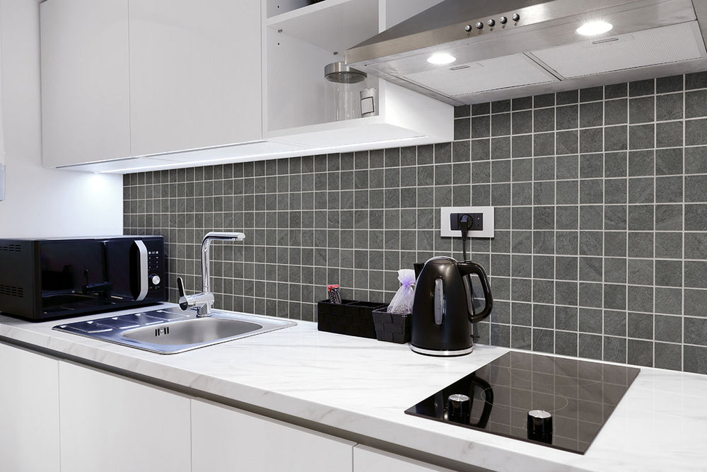 Emphasizing the beauty of LEGIONS MIDNIGHT MONTAGE 2X2MATTE MOSAIC PORCELAIN MOSAIC with a MATTE finish, complementing the contemporary décor with modern flair.