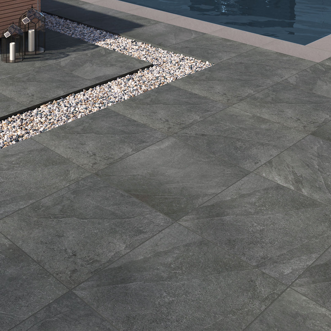 Deep black tones with a matte surface make Legion Black 24x24 paver porcelain tiles a bold and sophisticated choice.