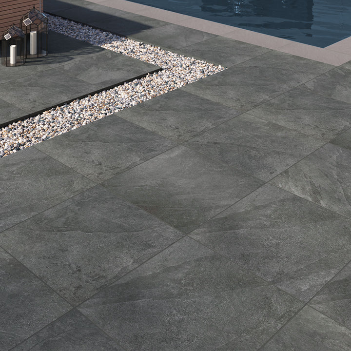 Deep black tones with a matte surface make Legion Black 24x24 paver porcelain tiles a bold and sophisticated choice.