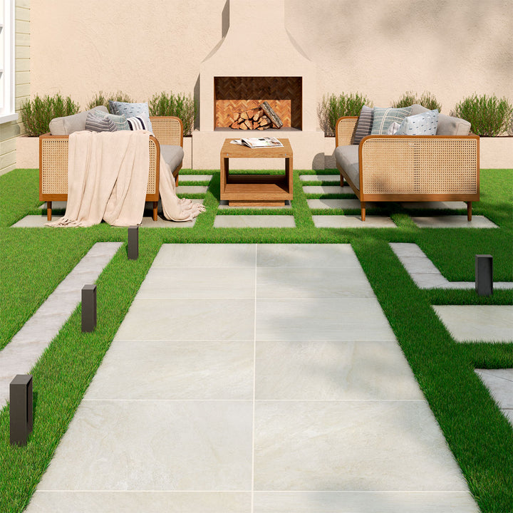 A cool white matte paver with a clean, structured design offers a sleek and contemporary feel, styled with Legion White-Cool 24x24 paver matte porcelain.