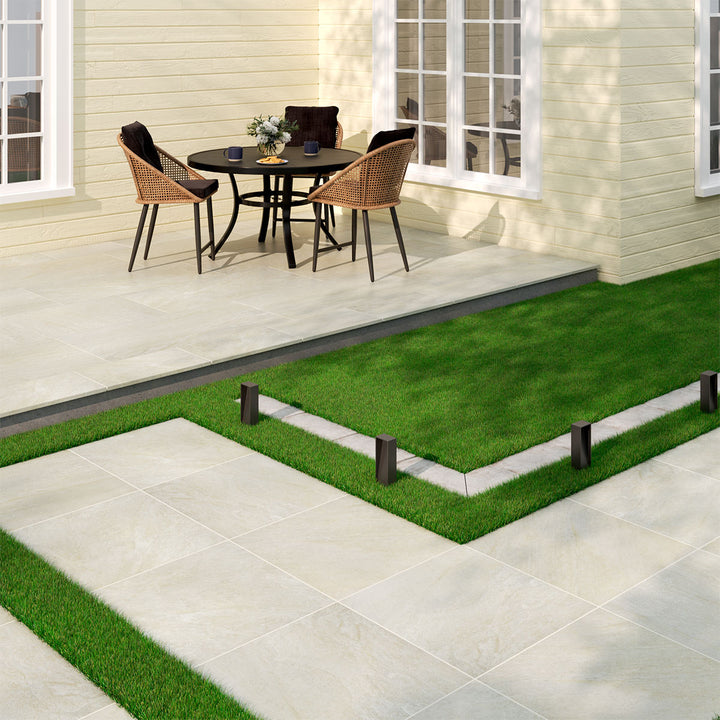 A crisp, clean white paver finish brightens the room, complementing the elegance of Legion White-Cool 24X24 Paver Matte Porcelain.