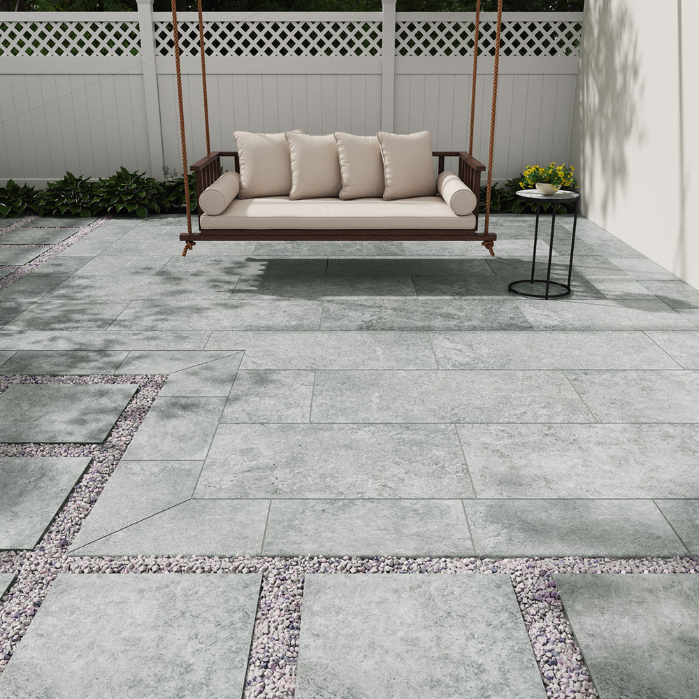 Bringing focus to the sophisticated look of LEGIONS SILVER TRAV 24X48 PAVER PORCELAIN PAVER with a MATTE finish, blending effortlessly with the surrounding modern elements.
