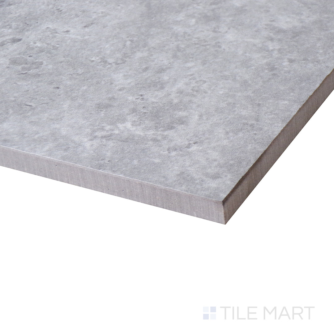Corner shot of LUNAR SILVER 24X24 MATTE PORCELAIN TILE with a MATTE finish, offering a close-up look at the product's durability and material thickness at the corner.