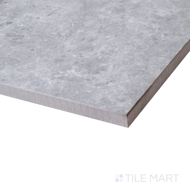 Corner shot of LUNAR SILVER 24X24 MATTE PORCELAIN TILE with a MATTE finish, offering a close-up look at the product's durability and material thickness at the corner.