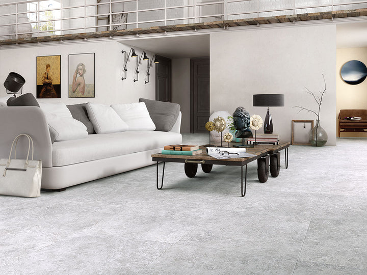 A soft silver-toned matte porcelain tile with a sleek surface delivers a refined and sophisticated look, blending seamlessly with Legion Lunar Silver 24x24 matte porcelain.