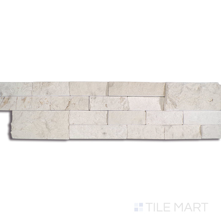 Angled shot of MAYRA WHITE LIMESTONE 6X24 PANEL LIMESTONE PANEL with a SPLITFACE finish, offering a detailed look at the material's finish with a tilted viewpoint.