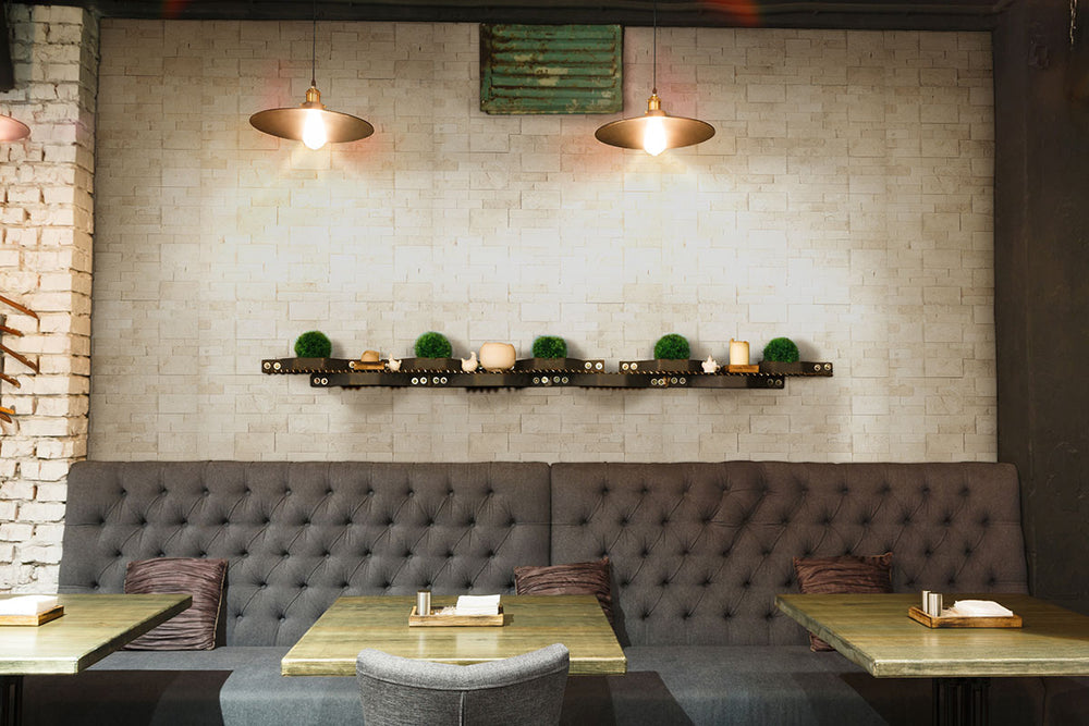 Presenting the stylish aesthetic of MAYRA WHITE LIMESTONE 6X24 PANEL LIMESTONE PANEL with a SPLITFACE finish, adding a touch of warmth and texture to the space.