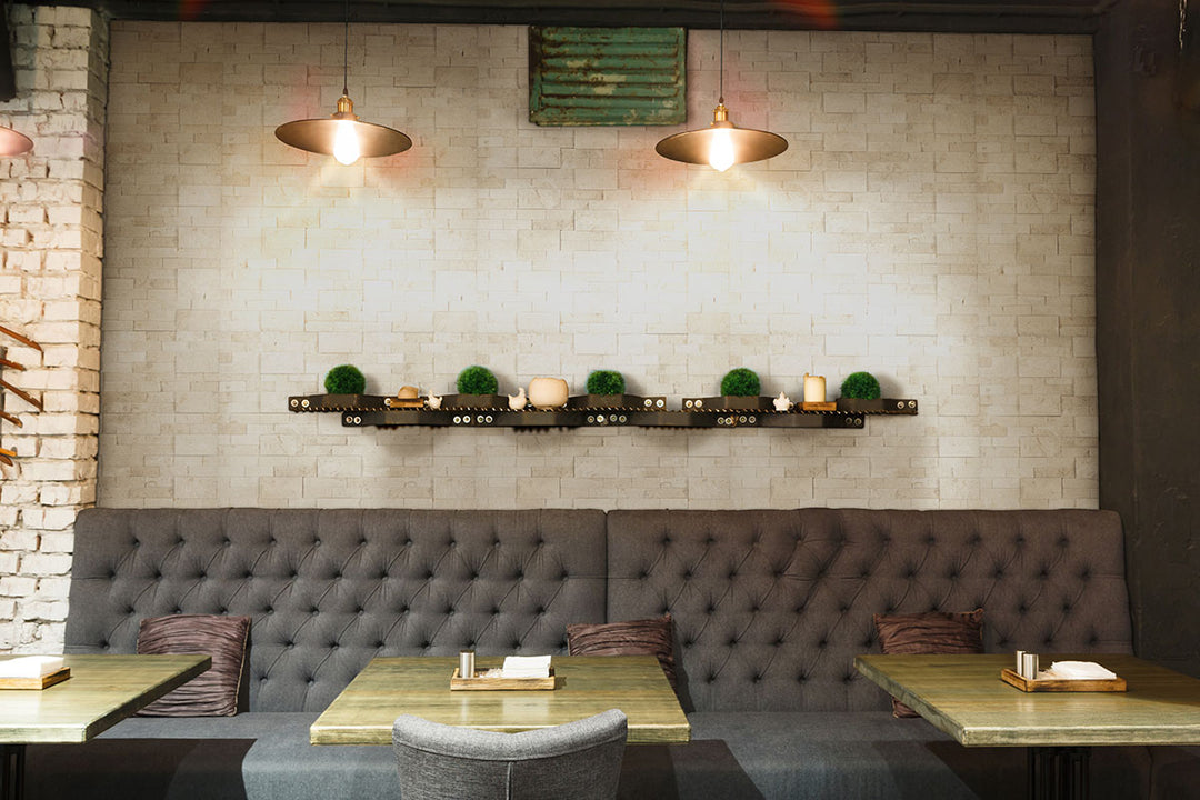 Presenting the stylish aesthetic of MAYRA WHITE LIMESTONE 6X24 PANEL LIMESTONE PANEL with a SPLITFACE finish, adding a touch of warmth and texture to the space.