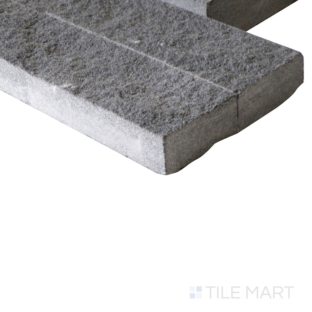 Corner shot of MOUNTAIN BLUESTONE 6x24 PANEL  SANDSTONE PANEL with a SPLITFACE finish, showing the robust material and finely finished edge through a focused corner view.