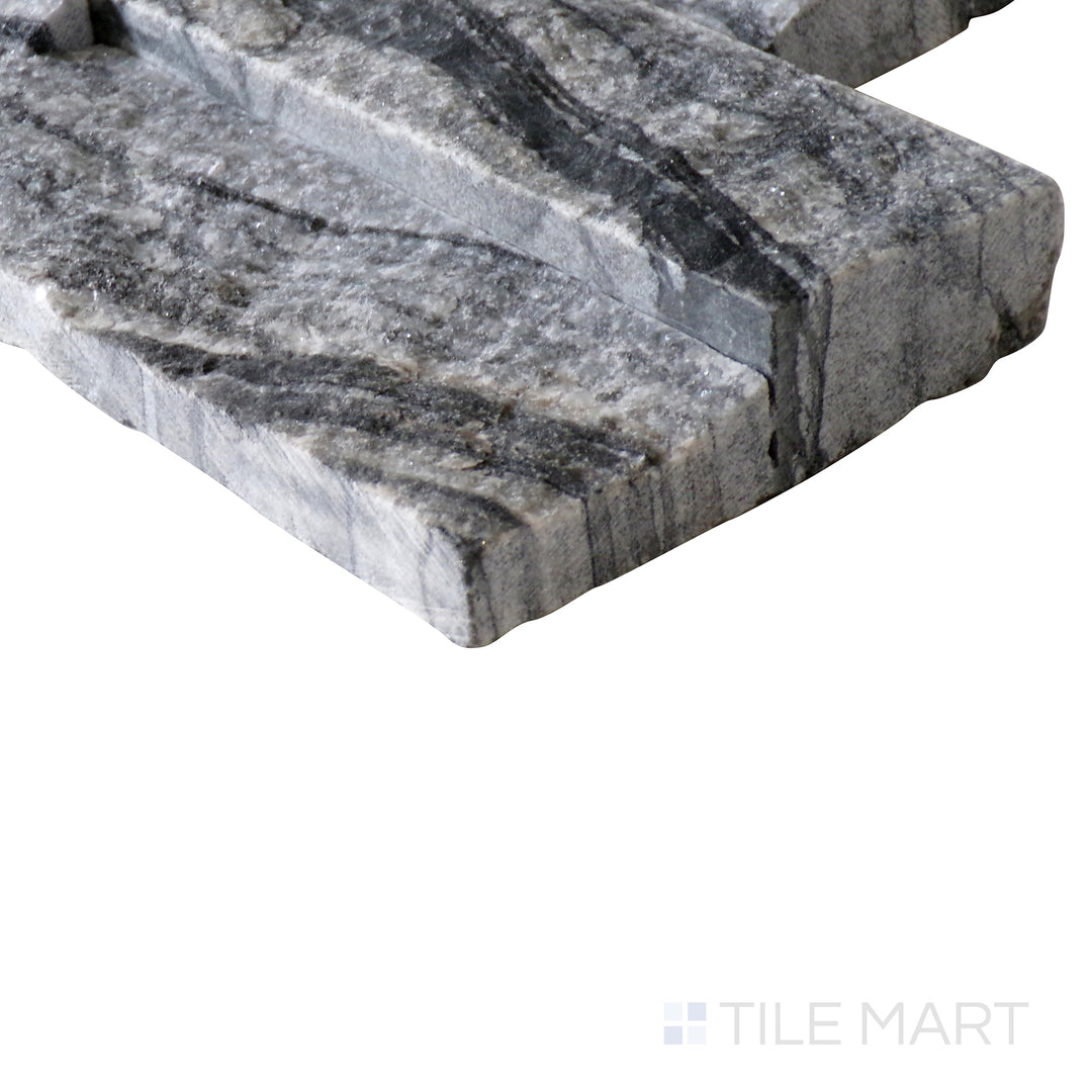 Corner shot of GLACIAL BLACK 6x24 PANEL  MARBLE PANEL with a SPLITFACE finish, revealing the intricate edge detailing and thickness from a corner viewpoint.