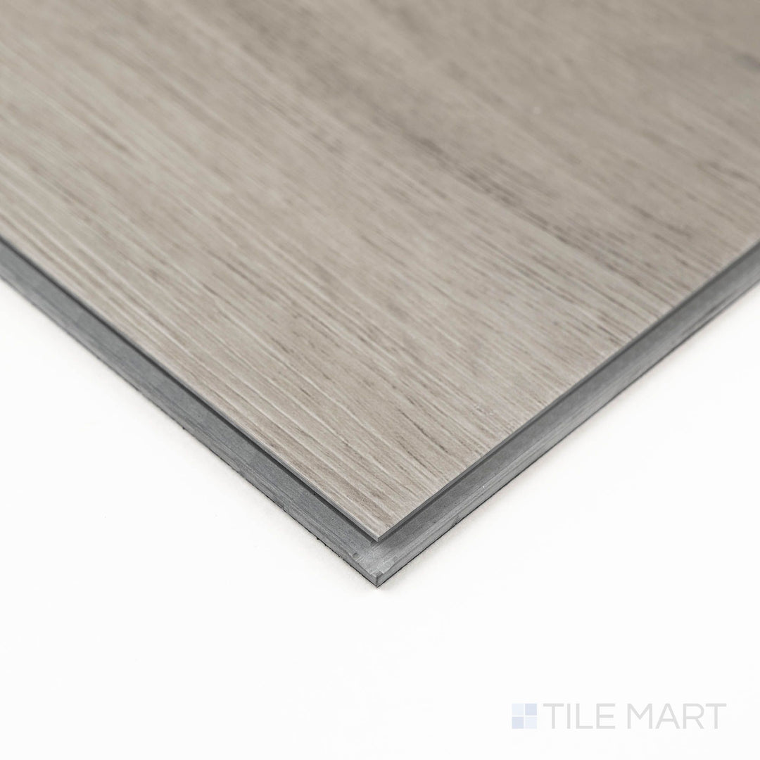 Corner shot of Prescott Brianka 7X48 Low Gloss Luxury Vinyl Plank highlighting the edge transition and soft grain detailing.