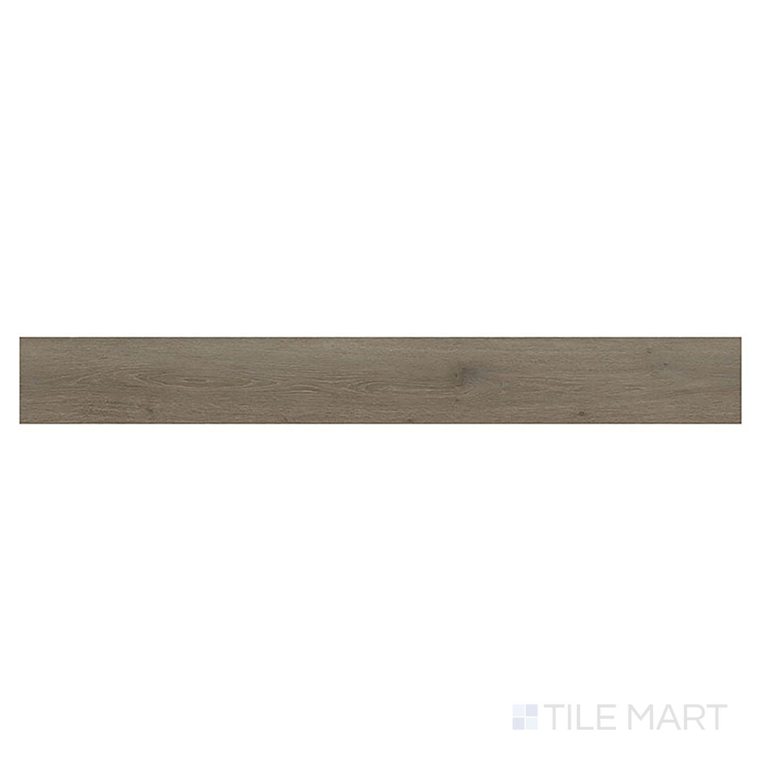 Seen in a top-down view, Prescott Cranton 7x48 low gloss vinyl plank offers earthy medium tones with a slightly aged wood feel.