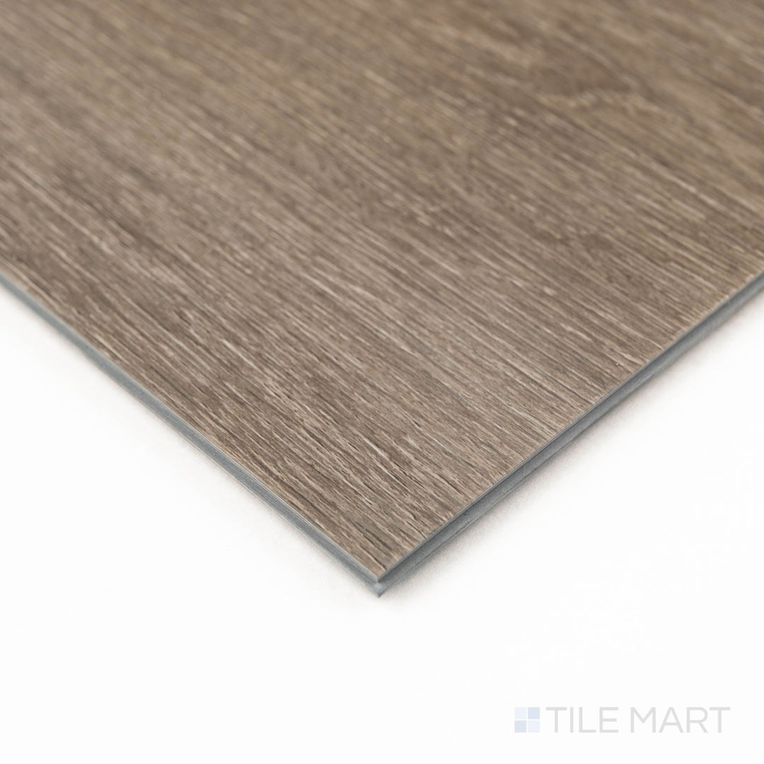Angled view of Prescott Cranton 7X48 Low Gloss Luxury Vinyl Plank, displaying corner joint and subtle wood textures.