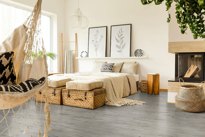 Natural-inspired room scene with Prescott Dunite Oak 7x48 low gloss vinyl planks, featuring soft taupe tones and realistic oak textures for a calming, organic ambiance.
