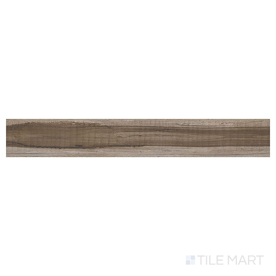 Top-down view of Prescott Exotika 7x48 low gloss luxury vinyl plank reveals rich, tropical wood tones with dramatic grain variation.