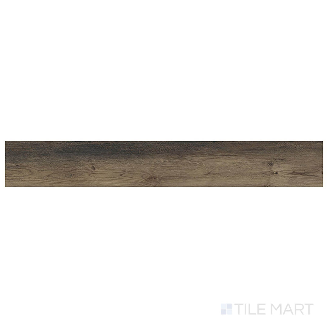 Top-down view of Prescott Stable 7x48 low gloss luxury vinyl plank reveals warm, medium-brown tones and classic wood styling.