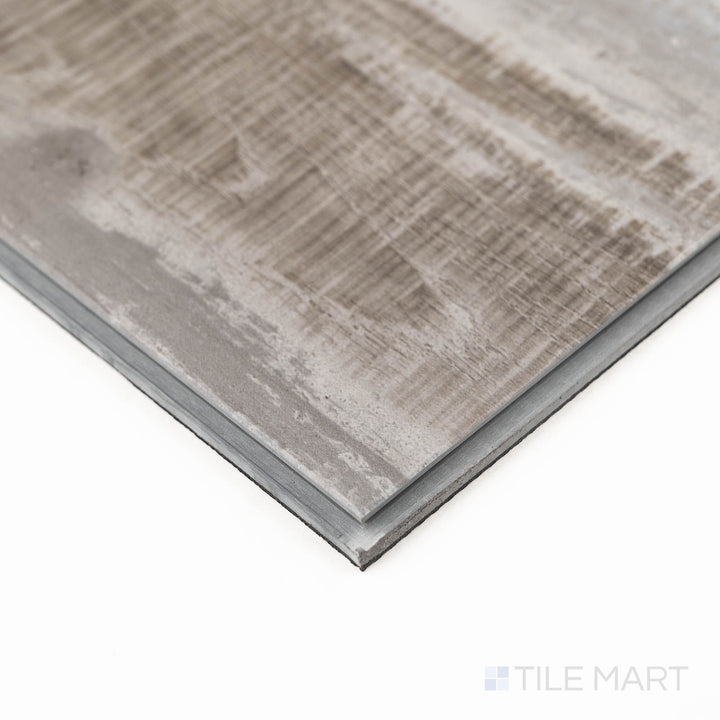 Corner capture of Prescott Weathered Brina 7X48 Low Gloss Luxury Vinyl Plank, showing nuanced texture and gray wood visuals.