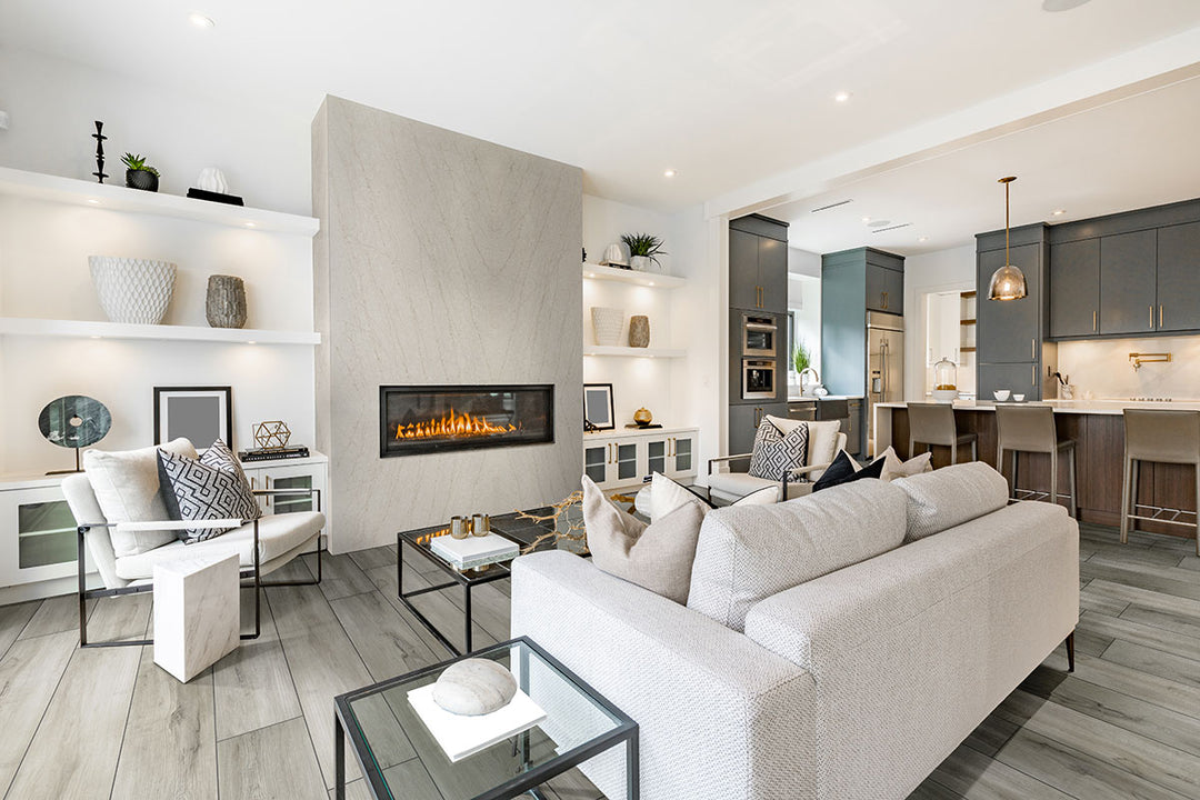 Scandi-inspired space grounded by Prescott XL Dunite Oak 9x60 vinyl flooring, where wide planks and muted oak tones enhance the light, clean design.