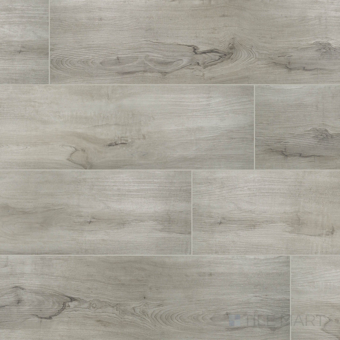 Overview of Prescott XL Dunite Oak 9x60 low gloss luxury vinyl plank – light oak finish with modern, spacious appeal.