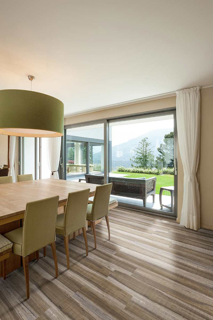 Modern open space with Prescott XL Exotika 9X60 flooring giving a rich and exotic hardwood feel.