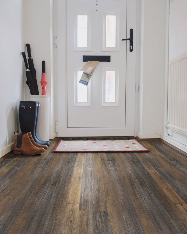 Cozy and contemporary room with Prescott XL Hawthorne 9X60 flooring creating a natural wood aesthetic.