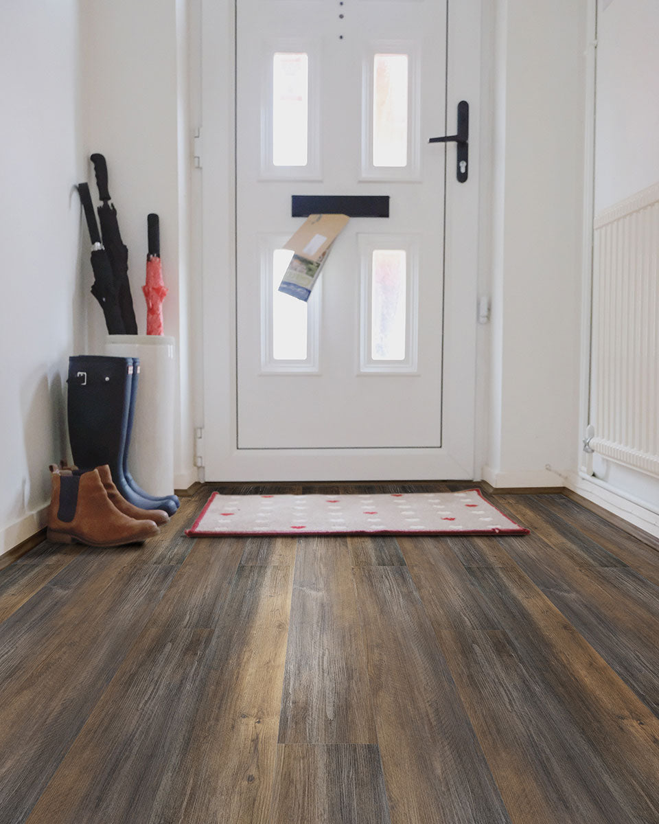 Cozy and contemporary room with Prescott XL Hawthorne 9X60 flooring creating a natural wood aesthetic.