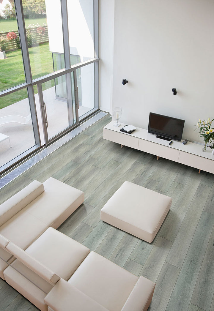 Prescott XL Kardigan 9X60 Low Gloss Luxury Vinyl Plank flooring in a cozy room scene.