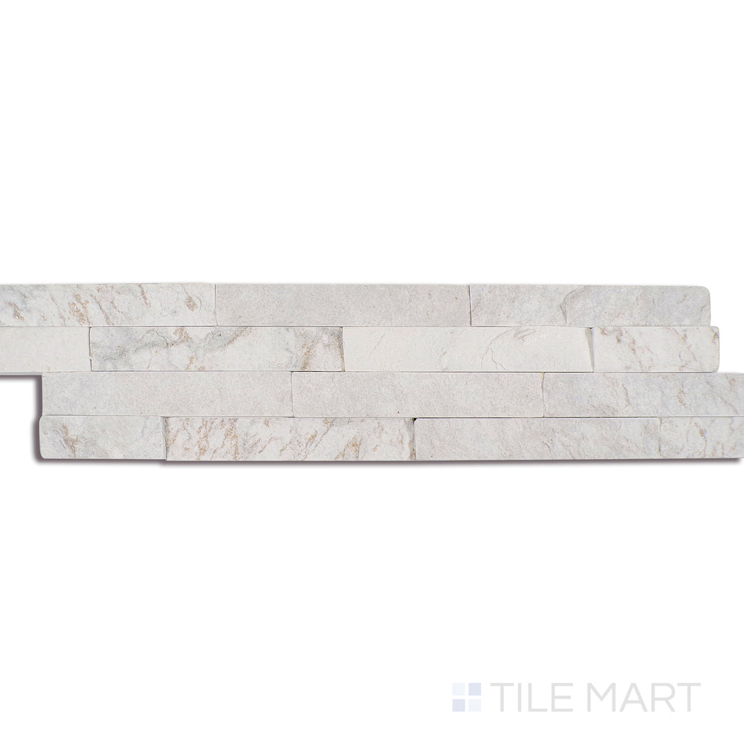 Angled shot of ROYAL WHITE SPLITFACE 6x24 PANEL  QUARTZITE PANEL with a SPLITFACE finish, demonstrating the material's surface and texture with a diagonal shot.