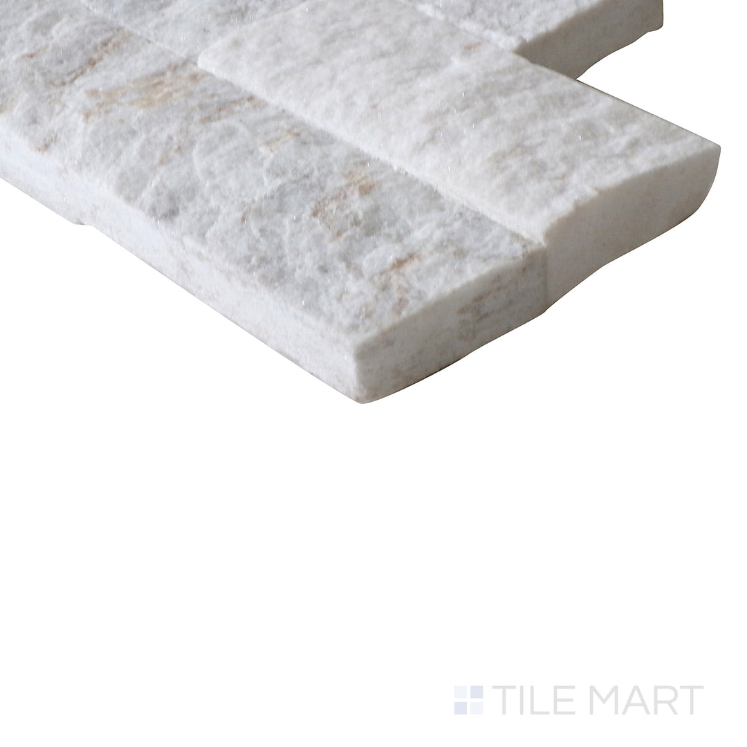 Corner shot of ROYAL WHITE SPLITFACE 6x24 PANEL  QUARTZITE PANEL with a SPLITFACE finish, capturing the thickness and material depth from an angled corner perspective.