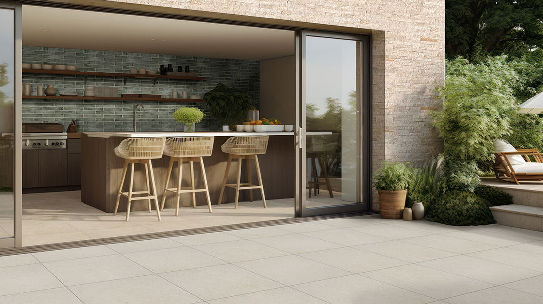 A bright white surface with rugged texture adds depth and dimension, elevating the design with Rockmount White 6x24 stacked stone panel splitface quartzite.