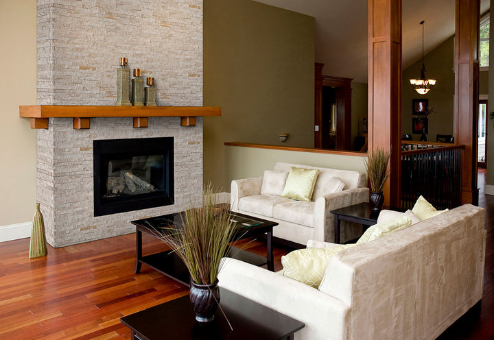 A white stacked stone panel with a textured splitface finish offers a timeless and natural appeal, making a bold statement with Rockmount White 6x24 stacked stone panel splitface quartzite.