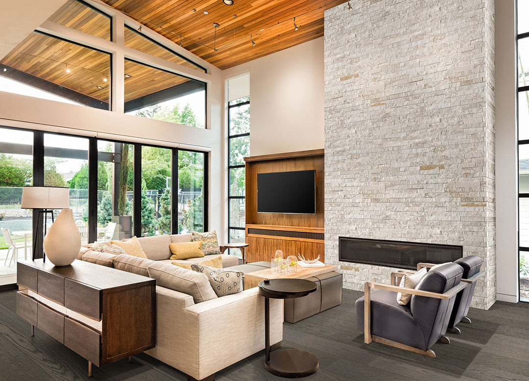 A sophisticated white stacked stone backdrop adds texture and depth, enhancing the aesthetic appeal of Rockmount White 6X24 Stacked Stone Panel Splitface Quartzite.