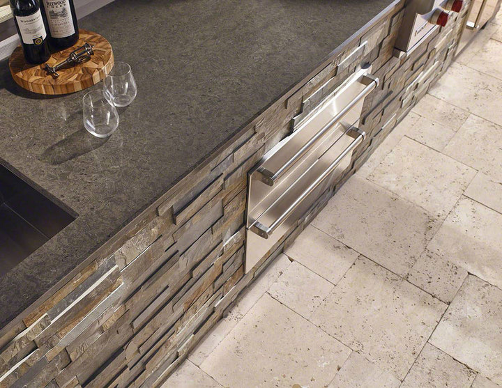 Earthy gold, rust, and brown tones create a striking look with Rockmount Rustic Gold 6x24 stacked stone panels in splitface slate.