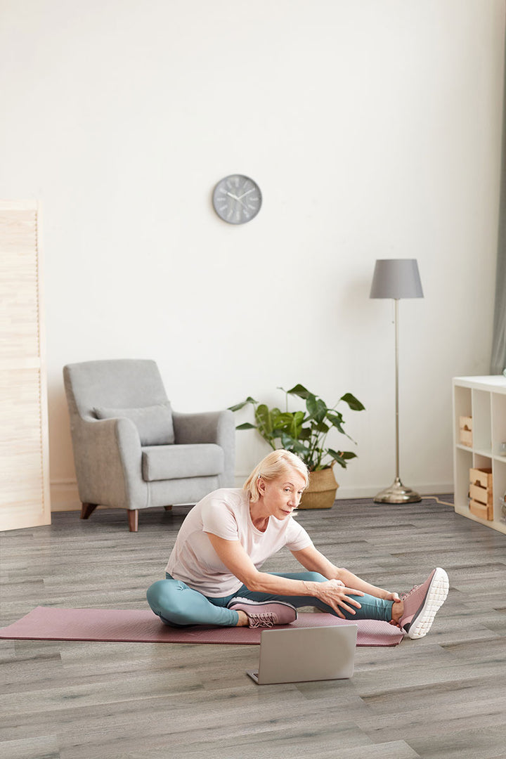 Modern living space featuring Smithcliffs Avery Ash 7x48 low gloss vinyl plank flooring, with soft ash-gray tones and natural wood texture for a sleek, versatile interior.