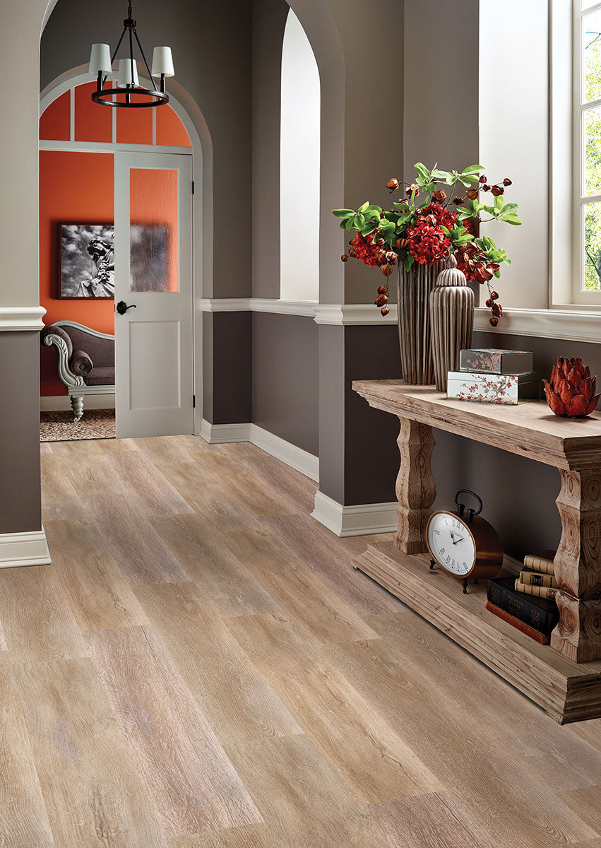 Warm, welcoming space using Smithcliffs Brockton 7X48 flooring to add depth and texture.