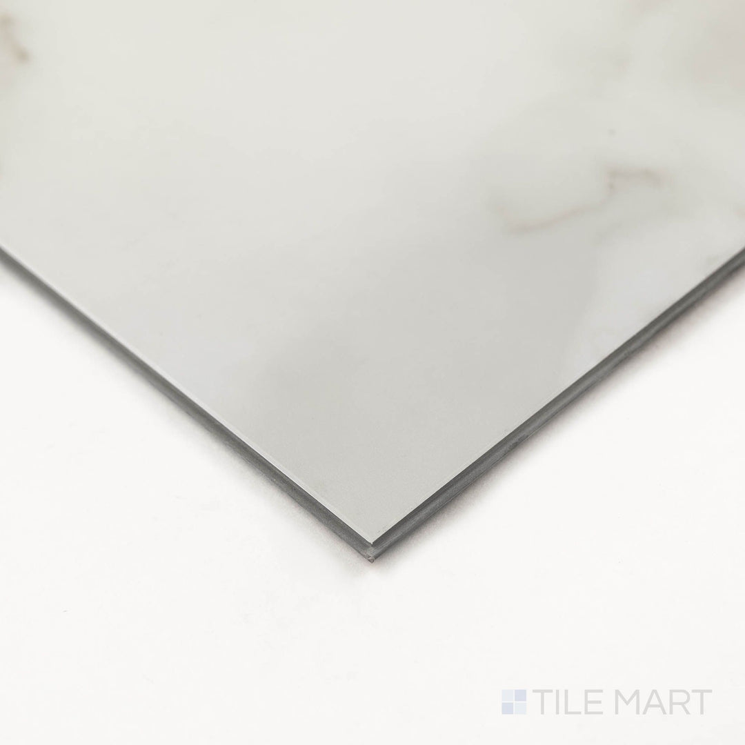 Corner image of Trecento Calacatta Venosa Gold 12X24 Low Gloss Luxury Vinyl Plank focusing on warm tones and natural pattern flow.