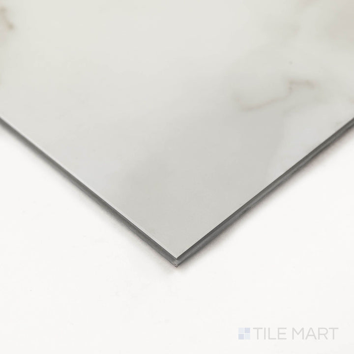 Corner image of Trecento Calacatta Venosa Gold 12X24 Low Gloss Luxury Vinyl Plank focusing on warm tones and natural pattern flow.