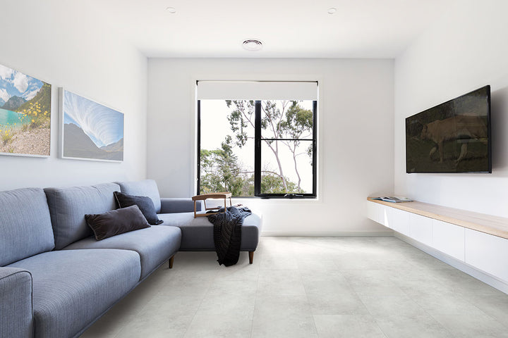 Stylish room with Trecento Mountains Gray 12X24 Low Gloss Luxury Vinyl Plank flooring.
