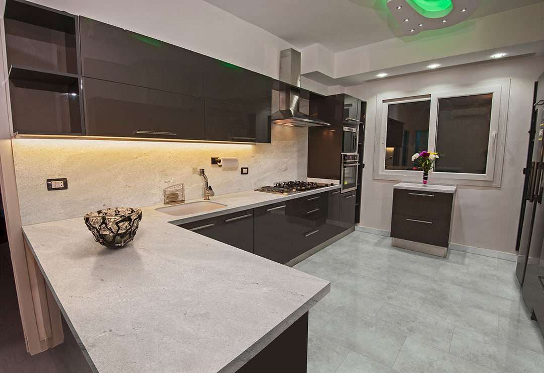 Modern room accented by Trecento Mountains Gray 12X24 flooring with cool stone-inspired tones.