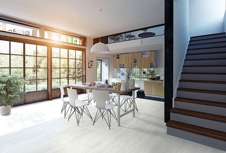 Bright bathroom or kitchen scene with Trecento White Ocean 12x24 low gloss vinyl plank flooring, featuring subtle waves and creamy white tones for a clean, calming effect.