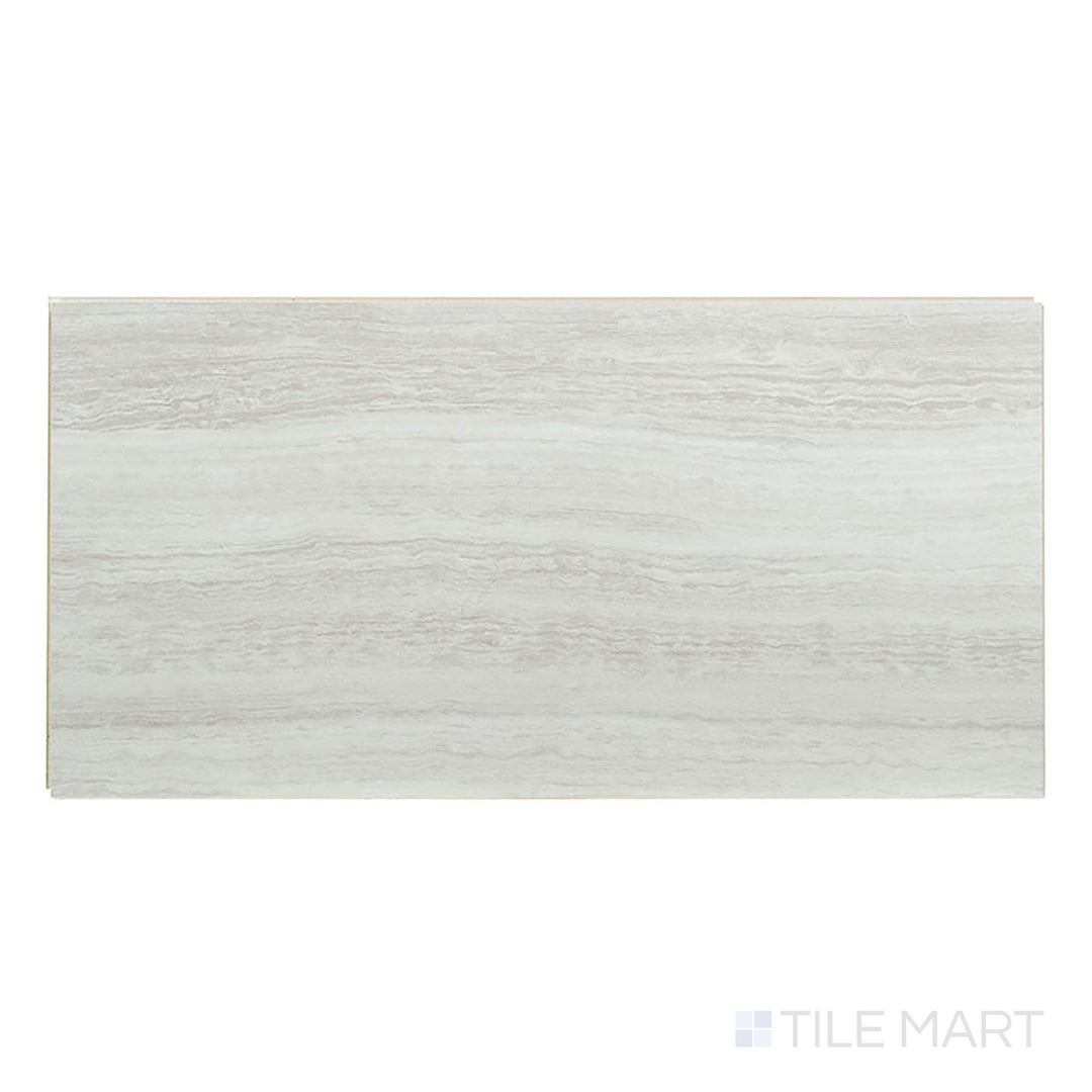Presented from above, Trecento White Ocean 12x24 low gloss vinyl plank features bright white stone appearance with subtle veining.