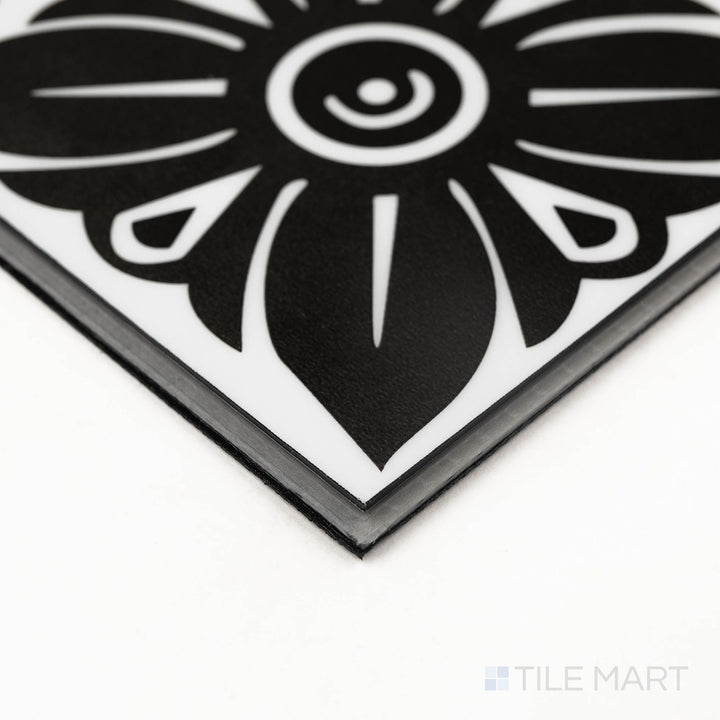 Trecento Windsor Crest 12X24 Low Gloss Luxury Vinyl Plank shown from the edge, capturing a clean corner seam and surface variation.