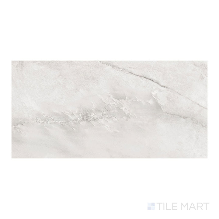 Presented from above, Trecento XL Quarzo Taj 18x36 low gloss vinyl plank emphasizes natural stone-inspired texture in warm neutral tones.
