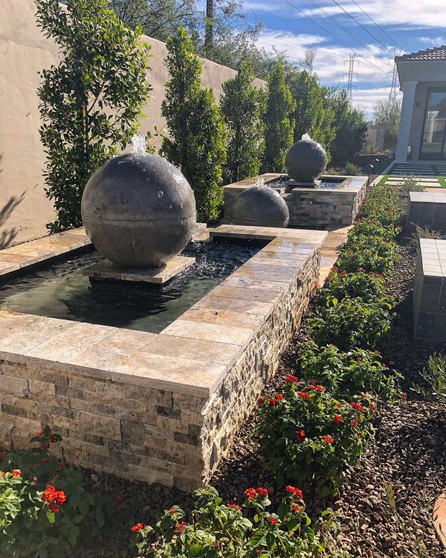 Highlighting the elegance of TUSCANY SCABAS TRAVERTINE 6x24 PANEL  TRAVERTINE PANEL with a SPLITFACE finish, creating a relaxed atmosphere with its serene presence.