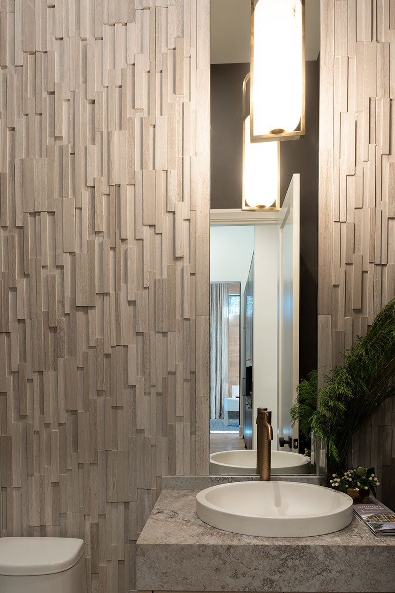 Displaying the refined texture of WHITE OAK 3D HONED 6x24 PANEL  MARBLE PANEL with a HONED finish, providing a durable yet stylish look to the interior.