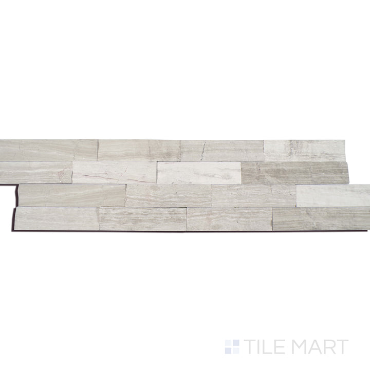 Angled shot of WHITE OAK MULTI SPLITFACE 6x24 PANEL  MARBLE PANEL with a SPLITFACE finish, showing the sleek surface and dimensionality from a slanted view.